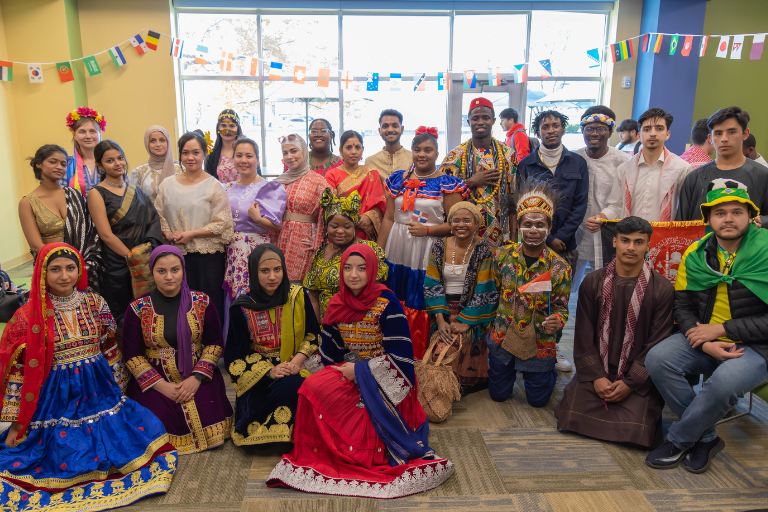 a group photo of bctc students in ethnic garb