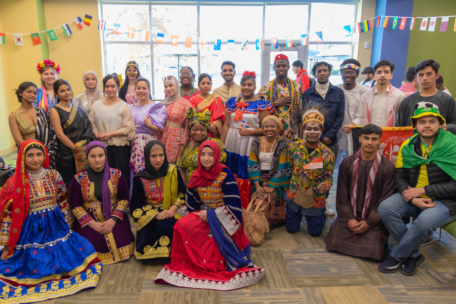 a group of students wearing cultural garments