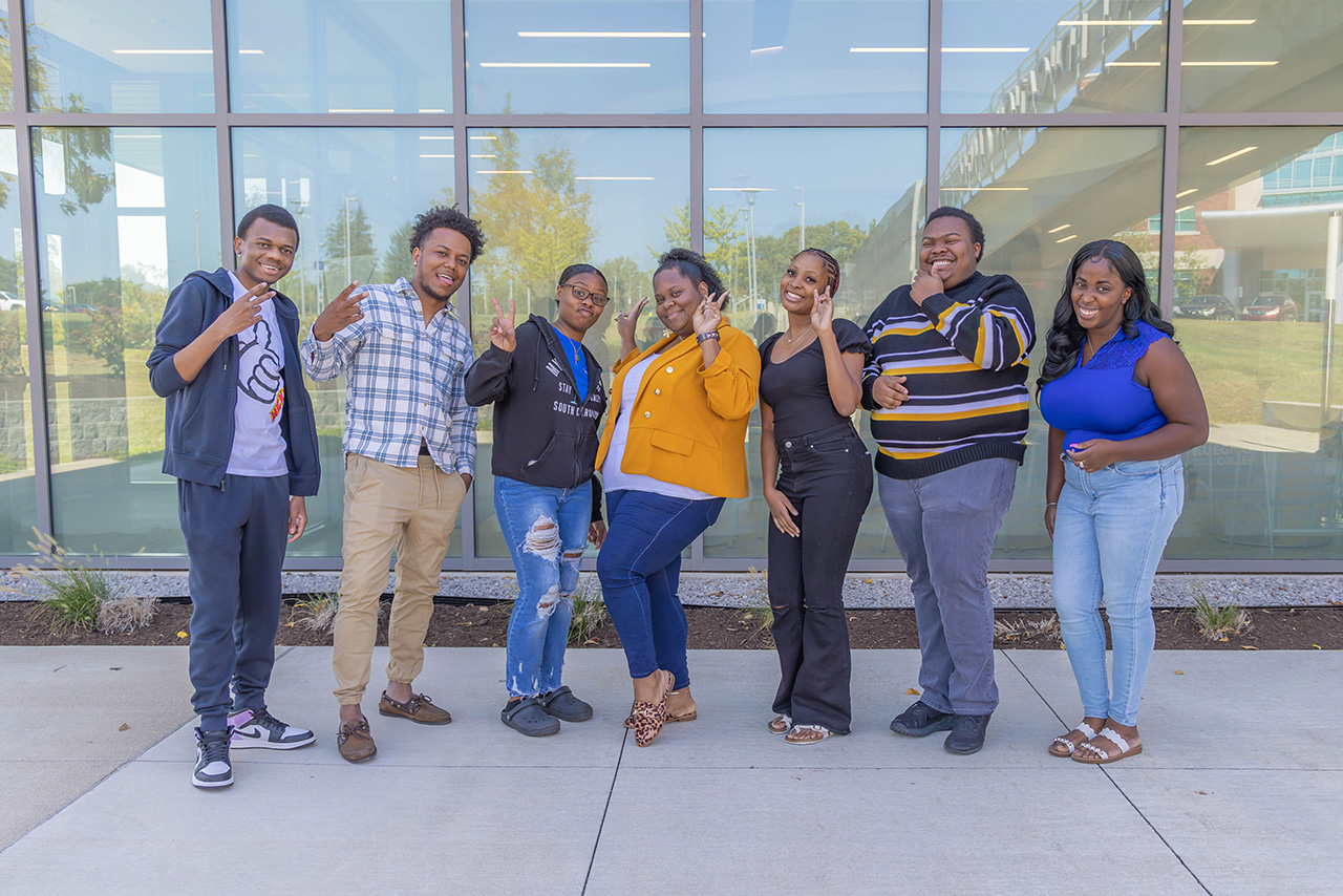 a group of bctc students and employees stand together smiling