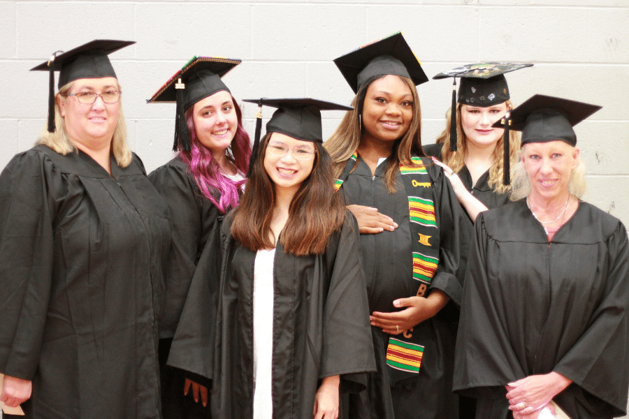 group of diverse students at graduation