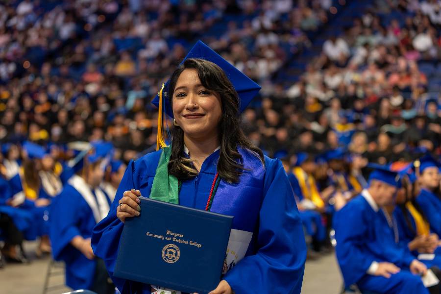 student with diploma