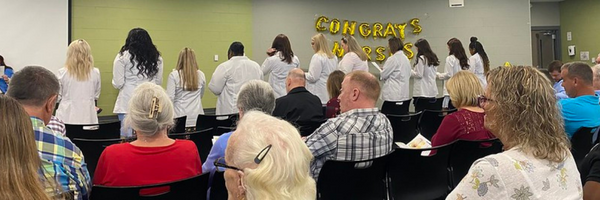 nursing graduates during pinning ceremony