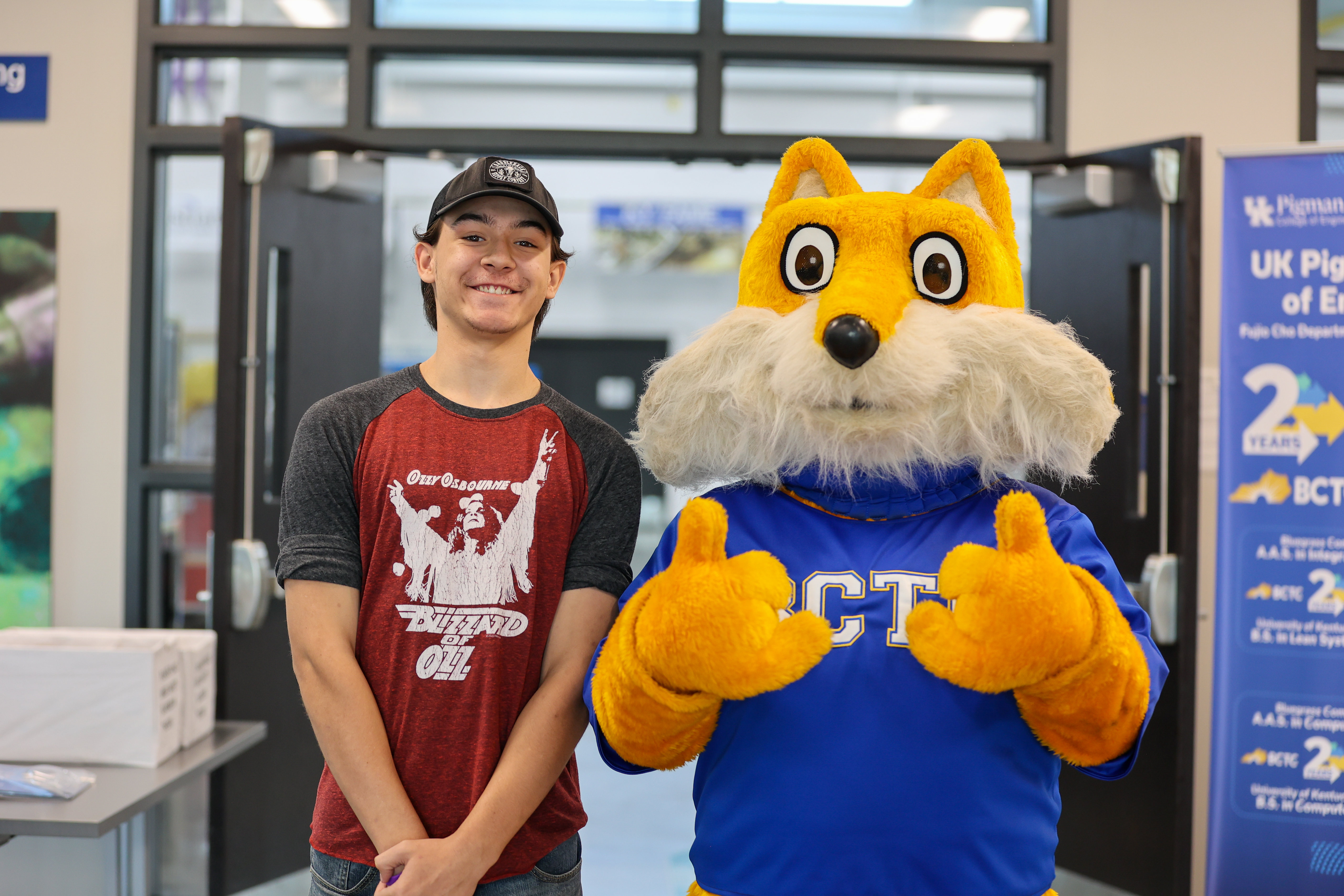 a high school students smiles with pathfinder