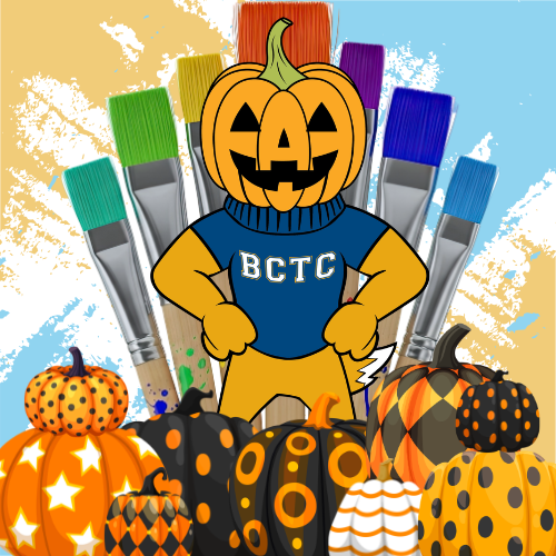 pathfinder wearing a pumpkin head surrounded by painted pumpkins and art supplies