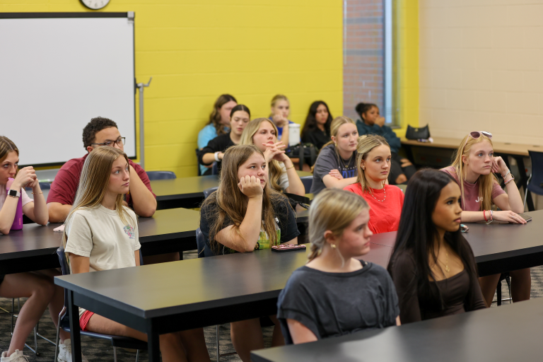 a group of students in a classroom