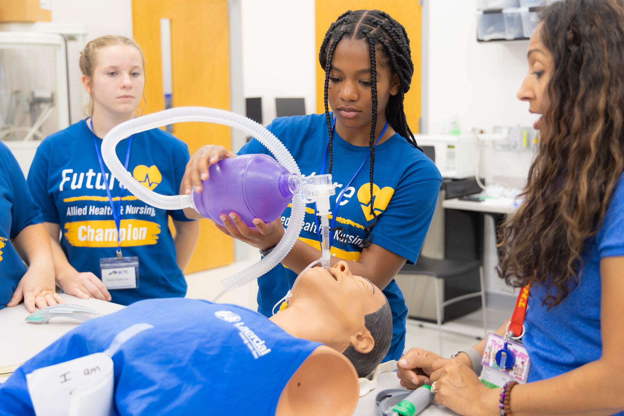 students practicing intubation on mannequin