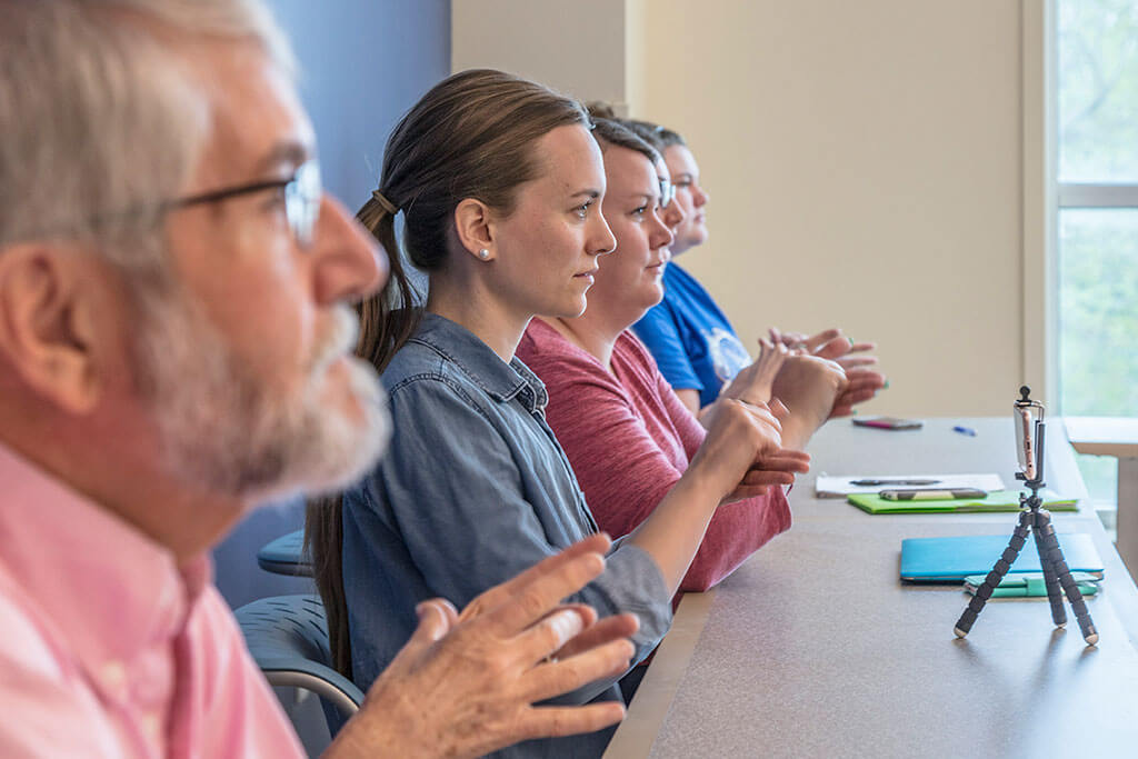 students being instructed in class