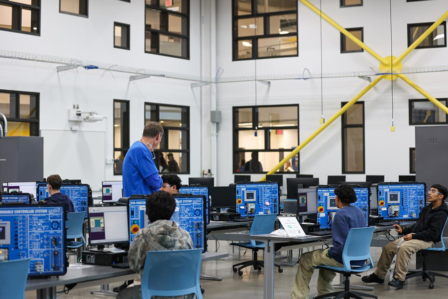 Students sitting at computers in engineering lab