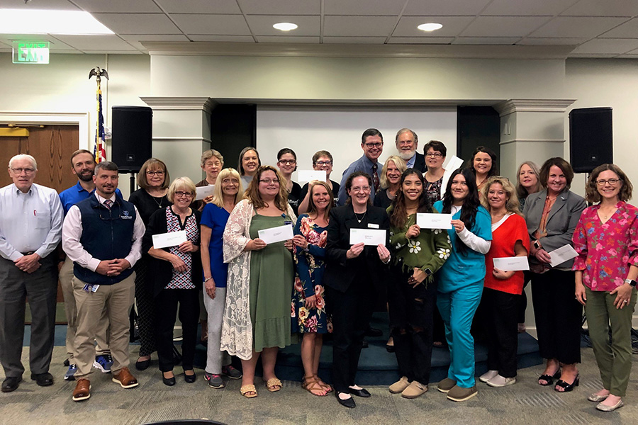 Group photo of Hudson-Ellis scholarship recipients with staff and faculty