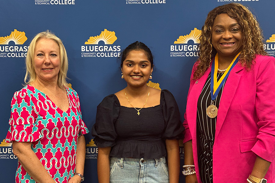 Rachel Sherin (middle) between BCTC representatives