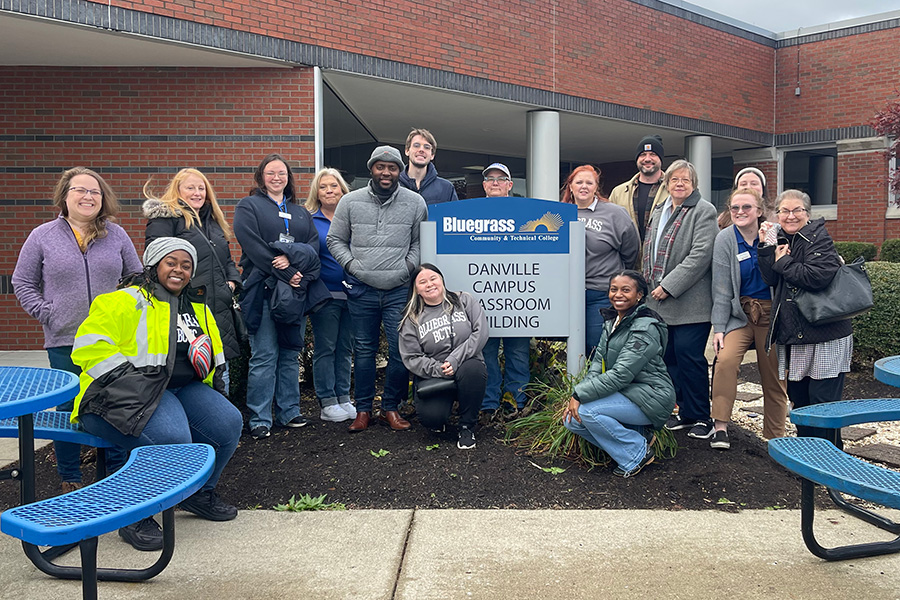 group photo of BCTC Danville staff by Danville Campus sign