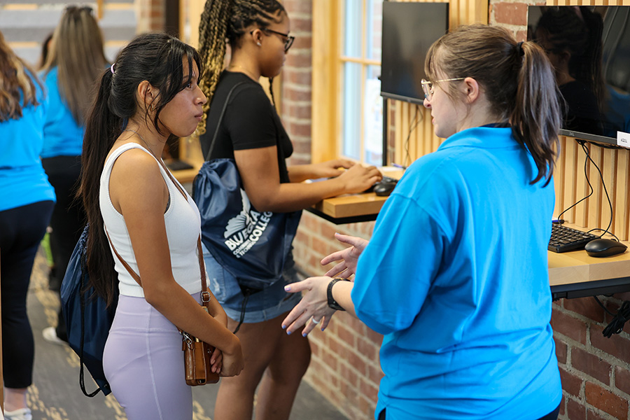 student talking to BCTC staff member