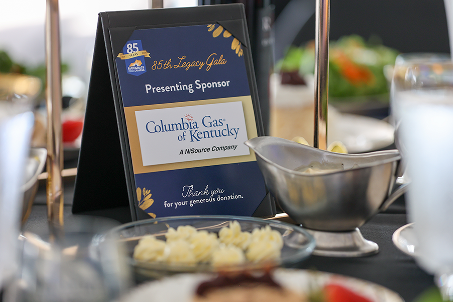 table with stand showing Columbia Gas of Kentucky sponsor card at BCTC 85th gala